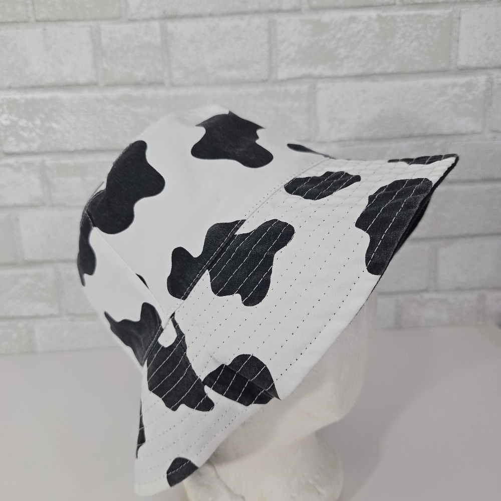 Reversible cow print and "cowgirl" bucket hat